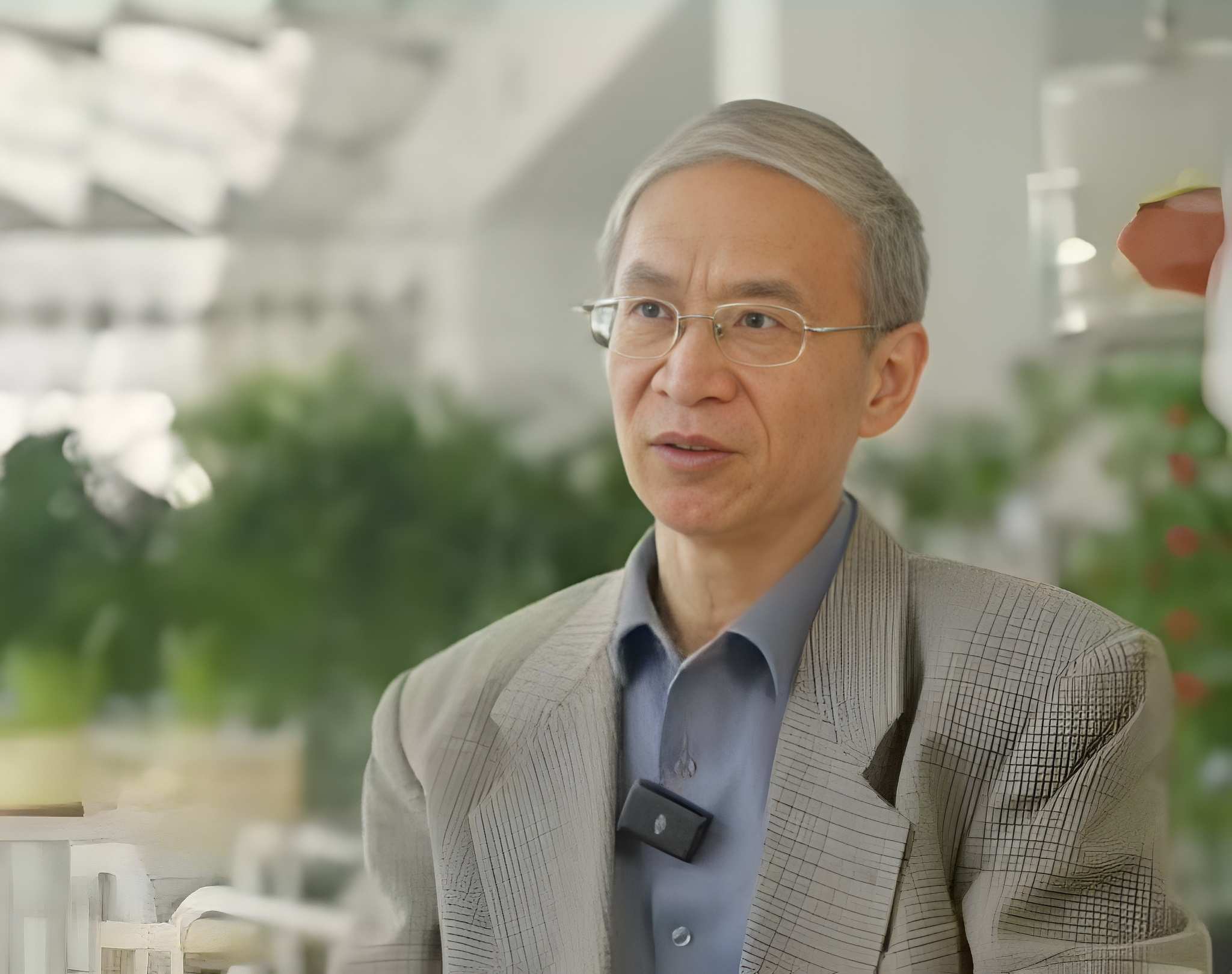 Portrait placeholder for Dr. Qiao